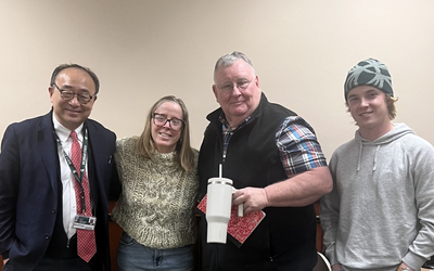 Left to right: Chaz Hong; Emily Burns; Edmund Ellsworth, professor and medicinal chemistry facility director in the MSU Department of Pharmacology and Toxicology; Will Burns.